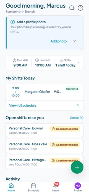 The carer home screen on a phone showing first and last shift, today's shifts, and open shifts nearby.